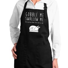 a woman wearing an apron with the words gobble me, shallow me on it