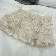 Sugar Thrillz By Dollskill White Crotchet Layered Mini Skirt Size Xs New W/O Tags Vintage White Skirt, White Grunge Outfit, Lacy Skirts, Diy Two Piece Outfit, Skirt Design Ideas, Aesthetic Skirts, Ruffle Tulle Skirt, Aesthetic Wear, White Ruffle Skirt