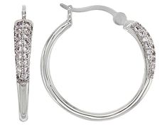 Bella Luce ® white diamond simulant 0.89ctw round, rhodium over sterling silver hoop earrings. Measure approximately 0.94"L x 0.06"W and have latch back backings. The diamond equivalent weight is 0.56ctw. Silver Small Hoop Diamond Earrings For Anniversary, Hypoallergenic Diamond Hoop Earrings In White Gold, Silver Hoop Diamond Earrings With Prong Setting, Silver Round Channel Set Earrings, Sterling Silver Hoop Diamond Earrings With Accents, Sterling Silver Round Channel Set Diamond Earrings, Classic Sterling Silver Hoop Earrings With Pave Setting, Silver Channel Set Round Huggie Earrings, Silver Round Channel Set Huggie Earrings