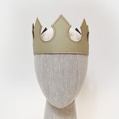 These medieval crowns are great for any royal themed event or anyone trying to finish a king, queen, prince, or princess costume. Each crown is made from vinyl leather with embroidered edges. Crowns have adjustable hook/loop fastening in the back to fit a range of sizes (one size fits most). Choose from 15 color options.Plain Crowns - Solid color crowns with matching stitching along the edges for a clean finishCrown with Jewels - Choose your crown color and then we will provide an additional lay Foam Crown Craft, Medieval Crowns, Crown With Jewels, Medieval King, Cosplay Crown, Medieval Crown, Medieval Cloak, Leather Crown, Pokemon Team