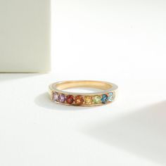 14K Yellow Gold Rainbow Ring, Semi-Precious 8 Multicolor Stone Band, Dainty Gemstone Wedding Band, 18K Gold Eternity Ring, Colorful Jewelry Gift Add vibrant elegance to your collection with our 9K/14K/18K Solid Gold Rainbow Ring. This dainty band features 8 semi-precious multicolor stones, perfect as a wedding band or solid gold eternity ring. Its colorful design makes it an ideal gift for any occasion. Product details: -- : Gem Stones Details : -- Gem Stone :  (Amethyst, Garnet ,Citrine, Perido Rainbow Multi-stone Birthstone Ring For Anniversary, Anniversary Multi-stone Rainbow Birthstone Ring, Anniversary Rainbow Multi-stone Birthstone Ring, Rainbow Colored Fine Jewelry Rings For Anniversary, Rainbow Ring Jewelry For Wedding, Rainbow Cubic Zirconia Jewelry For Wedding, Multicolor Cubic Zirconia Diamond Ring For Anniversary, Multicolor Gemstone Birthstone Ring For Wedding, Rainbow Jewelry With Accent Stones For Promise Ring