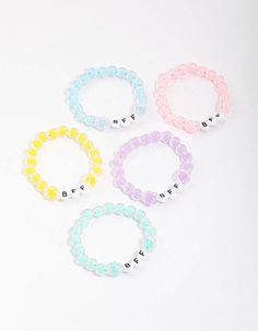 Let your little one express themselves with this pack of stacking bracelets. This bracelet pack includes five individual bracelets, designed with BFF charms in the centre. Style your favourite colours with your besties! Material: Beads Dimensions: Length Adjustable Weight: 31.2g | Lovisa Kids Rainbow BFF Beaded Stretch Bracelet 5-Pack, Blue Rainbow Letter Beads Friendship Bracelets For Beach, Rainbow Plastic Beaded Bracelets For Friendship, Cheap Kawaii Friendship Bracelets, Friendship Rainbow Beaded Plastic Bracelets, Lovisa Bracelet, Phonics Reading Passages, Bracelet Pack, Adjustable Weights, Word Bracelet