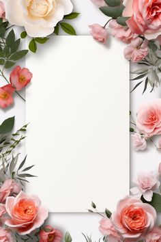 an empty paper surrounded by pink flowers and greenery on a white background with space for text