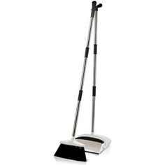 a floor sweeper with two brooms on it's sides and one in the middle