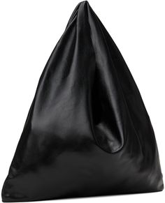 Polished sheepskin tote in black. · Draping throughout · Integrated carry handle · Logo embossed at face · Open throat · Unlined · H7 x W12 x D1 Supplier color: Black Designer Black Bag With Rolled Handles, Designer Black Shoulder Bag With Rolled Handles, Designer Black Bags With Rolled Handles, Black Shoulder Bag With Rolled Handles For Evening, Bindle Bag, Red Candy, Small Tote, Black Tote Bag, Embossed Logo