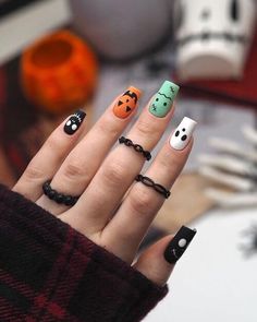 "Transform your nails into works of art with these #HalloweenNailDesigns that are sure to impress. Whether you're going for a classic black and orange look or something more unique, these #HalloweenNailIdeas have got you covered. 🕷️🕸️ #NailsofInstagram #HalloweenBeauty #NailAddict #HalloweenNailArt #HalloweenNailGoals #HalloweenNailInspo #NailEnvy #HalloweenNailGame #NailSwag #HalloweenNailGoals Holloween Nails Acrylic Short, Simple Halloween Nails Short, Cute Halloween Nails Short, Swaggy Nails, Zombie Nails, Cartoon Nails, Trends Nails, App Filter