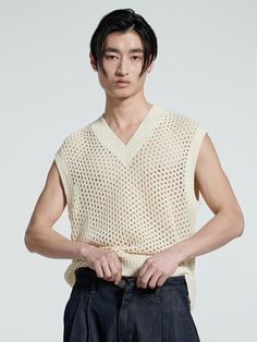 Editor's notesThis vest is made of punching and allows for various layered styling with breathable knitwear. The overall punching detail of the product expresses the texture of the net well, making it stylish and V-neck.- Punching detail- Intended for a loose fit- Ribbed finishes at edges- Versatile styling and easy layeringMeasurements(in.)One size(M-L)- Total length: 26.37 in.- Shoulder: 19.68 in.- Chest: 22.04 in.- Hem: 20.07 in.*Model info: Height 5'97, Waist 130lb, Fitting L size*Depending on the measurement method, an error of 1-3cm may occurComposition & Care- 100%Acrylic- Hand wash separatelyDesigner- by FIELD WORKER Casual Open Knit Vest For Layering, Knit Vest For Spring Layering, Summer Open Knit Layering Vest, Summer Open Knit Sweater Vest For Layering, Spring Open Knit Vest For Layering, Textured Knit Vest For Spring Layering, Summer Layering Pointelle Knit Sweater Vest, Spring V-neck Open Knit Tank Top, Workwear V-neck Vest With Button Closure