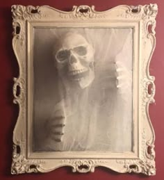 Halloween Mirrors Diy, Haunted Picture Frame, Halloween Decor Mirror, Spooky Mirror Halloween, Halloween Picture Frame Ideas, Spooky Picture Frame, Framed Halloween Art, Dollar Store Skull Ideas, Spooky Mirror Diy