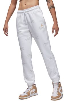 Perfect for playing or relaxing, these sweatpants made of cotton-blend fleece sport allover Flight logos and handy pockets for stowing essentials. 29" inseam; 12" leg opening; 11" front rise; 16" back rise (size Medium) Elastic/drawstring waist Side-seam pockets Elastic cuffs 80% cotton, 20% polyester Machine wash, tumble dry Imported Nordstrom x Nike: A curated lifestyle destination where fashion is the ultimate sport Athleisure Bottoms With Logo Print, Athleisure Bottoms With Logo Print For Loungewear, Athleisure Bottoms For Loungewear With Logo Print, Logo Print Cotton Pants For Loungewear, Cotton Logo Print Loungewear Pants, Cotton Loungewear Pants With Logo Print, Casual Jogging Bottoms With Logo Print, Cotton Jogging Bottoms With Logo Print, Casual Pants With Logo Print For Loungewear