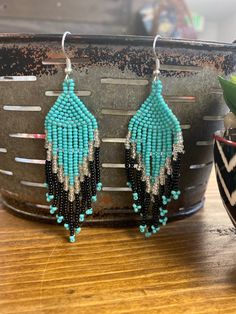 Fish Hook Top Beaded Earring Measures: 3" Beaded Earring, Jewelry Inspo, Fish Hook, Beaded Earrings, Crochet Bikini, Beading, Turquoise, Fish, Drop Earrings