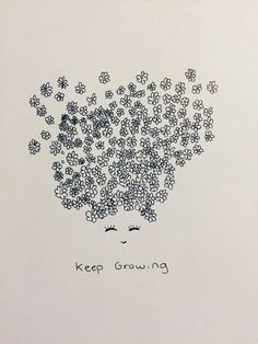 a drawing of a woman's face with flowers coming out of her hair that says keep growing