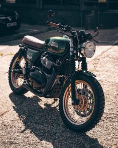 a motorcycle parked on the side of a road