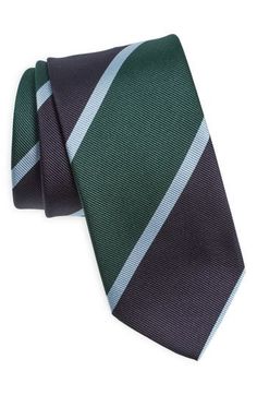 Blocky stripes bring traditional, old-school design to a tie that's crafted from polished silk and styled to smarten any formal or semiformal look. 100% silk Dry clean Made in the UK Classic Vertical Stripes Ties For Black Tie Occasions, Classic Vertical Stripes Tie For Black Tie Events, Classic Ties With Vertical Stripes For Black Tie Events, Classic Ties With Vertical Stripes, Classic Black Tie With Vertical Stripes, Classic Green Ties For Formal Occasions, Classic Green Formal Tie, Classic Green Tie For Semi-formal Occasions, Classic Green Suit And Tie Accessories For Semi-formal