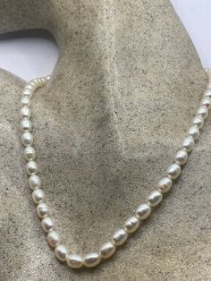 Vintage white Pearl 16 in Necklace  Freshwater Pearl necklace. We can add an extension to legthen  All jewelry is shipped in a nice gift box.   Check out our over a THOUSAND great reviews Classic Pearl Necklace For Gift, Classic Pearl Necklace Gift, Classic Single Strand Necklace Gift, Classic Pearl Necklace As A Gift, Classic Pearl Necklace With Round Beads, Classic Pearl Necklace With Round Beads As Gift, 16 Inch White Pearl Necklace For Gifts, Classic Single Strand Pearl Necklace Gift, Classic Single Strand Pearl Necklace As Gift