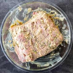 a piece of meat in a glass bowl