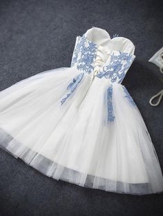 1, Material: lace, aplique, tulle, elastic satin like silk.2, Color: it can be in custom color, please contact us and tell us dress number, then we will send you more colors to choose.3, Size: can do both standard size and custom size. If you need do custom sized dresses, please send us following measurements or leave a note when place an order.bust______ cm/inchwaist______cm/inchhip:_______cm/inchdress length:_______cm/inchshoulder to shoulder :_______cm/inch (measured from back of shoulder)sho White Prom Dress Short, Short Strapless Prom Dresses, Elegant Homecoming Dresses, Mini Prom Dresses, Cheap Party Dresses, Mini Homecoming Dresses, Cheap Homecoming Dresses, Tulle Homecoming Dress, Junior Prom Dresses