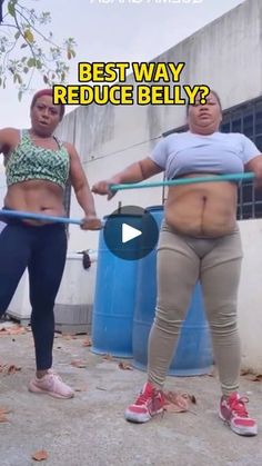 two women are doing exercises on the street