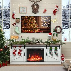 a living room decorated for christmas with stockings and decorations on the fireplace, deer head hanging over it