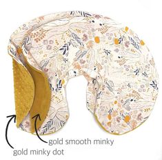 the gold minky dot has been made with fabric and is ready to be used as a pillow