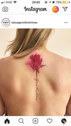 a woman with a rose tattoo on her back