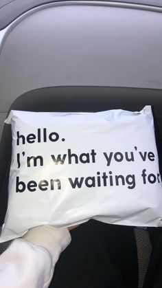 someone is holding a pillow that says hello, i'm what you've been waiting for