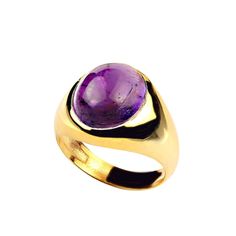 This is part of Chairish’s Fine Jewelry assortment.  Elegant 8.28ct Oval Amethyst Cabochon Ring in Gold Rhodium over Sterling Silver  Add timeless sophistication to your jewelry collection with this 8.28-carat oval Amethyst cabochon ring, elegantly set in a custom gold rhodium-plated bezel over sterling silver. This versatile piece is designed to complement both daily wear and evening ensembles, making it a go-to accessory for any occasion.  Key Features Stunning Amethyst Gemstone: The oval cabo Luxury Amethyst Cabochon Ring For Formal Occasions, Luxury Oval Gemstone Cabochons, Luxury Round Cabochon Amethyst Ring, Luxury Formal Amethyst Cabochon Ring, Luxury Formal Cabochon Amethyst Ring, Luxury Yellow Gold Amethyst Ring Oval Cabochon, Luxury Yellow Gold Amethyst Ring With Bezel Setting, Oval Cabochon Signet Ring For Formal Events, Formal Cabochon Amethyst Ring Fine Jewelry