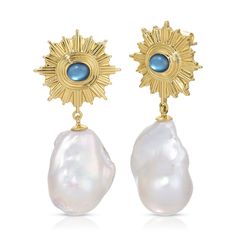 Indulge in the celestial allure of the evening sky and exude grace wherever you venture with our baroque pearl drop earrings. Adorned with exquisite blue mother of pearl for an ethereal radiance. 14k gold plated brass Genuine Baroque Pearls (each pearl is unique and we try to match them in a pair, but please note no 2 are exactly alike adding to the natural beauty) Mother of Pearl Earrings are roughly 1 5/8 inches (42mm) long Questions about Shipping & Returns? Luxury Blue Pearl Drop Jewelry, Luxury Blue Jewelry With Pearl Drop, Blue Gemstone Luxury Pearl Earrings, Luxury Blue Gemstone Pearl Earrings, Blue Luxury Pearl Earrings With Gemstone, Luxury Blue Pearl Drop Earrings, Blue Pearl Earrings With Pearl Charm, Blue Drop Pearl Earrings With Pearl Charm, Blue Baroque Pearl Jewelry With Pearl Drop