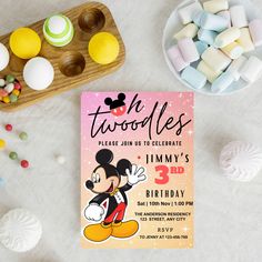 a mickey mouse birthday party with candy and marshmallows