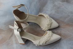 Ivory Wedding Shoes Tulle , guipure embellished bridal shoes 3 different heel types - 6cm , 7cm and 9 cm These shoes will look great on you along with your wedding dress at your wedding. Everyone's eyes will be on you. Cream Pointed Toe Wedding Shoes, Off White Closed Toe Heels For Wedding, Elegant Pearl Embroidered Wedding Shoes, Pearl Embroidered Closed Toe Wedding Shoes, Pearl Embellished Closed Toe Wedding Shoes, Pearl Embellished Closed Toe Wedding Shoes For Ceremony, Pearl Embellished Closed Toe Wedding Shoes For Reception, Pearl White Heels For Wedding With Round Toe, Pearl White Pointed Toe Wedding Shoes