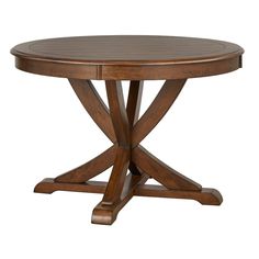 a round wooden table with an x - shaped design on the top and two leaves at the base