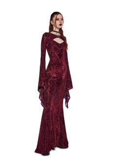 cuz you run this realm. This maxi dress has a semi-sheer stretchy mesh construction, a velvet flocked design, picot trim, adjustable shoulder straps, a back button closure, and a matching long bell sleeve shrug with a moon-shaped charm hook closure. Vampire Gown, Goth Gown, Villain Dresses, Gothic Gowns, Winter Gowns, Vampire Dress, Dark Red Dresses, Sleeve Shrug, Red Dolls