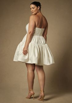 Bridal by ELOQUII Mini Flare Dress With Structured Bodice | Eloquii Mini Dress With Back Zipper For Wedding, Strapless Dress With Back Zipper For Cocktail, Wedding A-line Mini Dress With Back Zipper, A-line Mini Dress With Back Zipper For Wedding, Knee-length Corset Dress With Boned Bodice, Strapless Wedding Dress With Back Zipper, Strapless Mini Dress With Fitted Bodice And Back Zipper, Strapless Mini Dress With Fitted Bodice For Dress Down, Sleeveless Dresses With Ruched Bodice And Voluminous Skirt