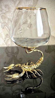 a glass that has some kind of scorpion in it