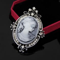 One Of My Best Sellers When I Do Shows. This Gorgeous Pin Is A Resin Cameo (The Color May Vary Slightly) In An Antiqued Silver Victorian Style Setting And Framed With Stunning Clear Aaa Cz's. Wear It As A Pin Or Brooch Or Put It On A Ribbon And Wear It As A Choker Or Long Necklace. The Possibilities Are Endless. Great For Gifts. Buy Will Supplies Last. Clearing Out Stock To Make Room For Much New Stock. Bundle And Save More, Like My Items And Be Notified Of Super Sales. Pageant Jewelry, Bouquet Jewelry, Cameo Jewelry, Wedding Brooch, Vintage Cameo, Cameo Brooch, Fancy Jewelry, Pin Jewelry, Vintage Crystal