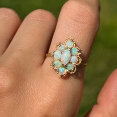 Vintage 14KT yellow gold multi toned, genuine, round and marquise opal ring. Size 7 Can be resized for an additional fee Stamped 14K Very Good Condition Luxury Gold Victorian Opal Ring, Moonstone Ring Vintage, Bohemian Wedding Ceremony, Italian Minimalism, Vintage Opal Ring, Opal Ring Vintage, Rings Opal, Jewelry Wishlist, Opal Ring Gold