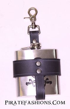 a black and silver flask keychain attached to a white background with the words pirates fashions com written on it