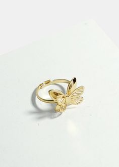 Butterfly Stainless Steel Ring Gold JEWELRY - Shop Miss A Adjustable Open Butterfly Ring For Promise, Adjustable Open Butterfly Promise Ring, Adjustable Elegant Rings With Butterfly Charm, Adjustable Open Butterfly Ring For Weddings, Spring Gold Jewelry With Butterfly Charm, Adjustable Butterfly Promise Ring, Adjustable Gold Butterfly Ring, Adjustable Gold Butterfly Open Ring, Elegant Spring Butterfly Jewelry