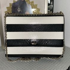 Kate Spade Benson Lane Melodie Shoulder Purse In Euc, Original Retail Is $500 Black And Off-White Striped Bag With Gold Chain Strap And Hardware. I Didn’t Use This Much, But The Corners Show Wear And Could Be Fixed. Approximate Measurements: 11” X 9” X 2”. Strap Drop Is 11” Or 20” Depending On Whether You Double The Chain. Three Sections Plus An Interior Zip Pocket. Closure Push Lock “Some Wear At Corners - See Photos” Striped Bags, Shoulder Purse, Chain Strap, Purses Crossbody, White Stripe, Gold Chains, Zip Pockets, Kate Spade, Bag Lady