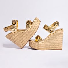 Milan Espadrille In Gold Metallic Leather Luxury Summer Wedge Sandals, Leather Woven Leather Espadrilles, Luxury Sandals With Buckle Closure For Vacation, Modern Gold Wedge Sandals For Spring, Chic Woven Leather Espadrilles For Beach, Luxury Woven Leather Sandals For Vacation, Spring Gold Leather Wedge Sandals, Modern Gold Wedge Sandals For Summer, Summer Leather Espadrilles With Woven Detail