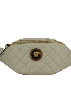 Indulge in the epitome of luxury with this pristine white Belt Bag, a masterpiece from the renowned house of Versace. Expertly crafted from sumptuous 100% lamb leather, this brand new accessory is accompanied by tags and its original dustbag. Its compact silhouette, featuring a secure zip closure, unravels to reveal a meticulously organized main compartment. Inside, an internal slip pocket with signature logo details ensures your essentials remain neatly stowed. Designed for comfort and versatility, the adjustable leather belt strap allows you to wear it in multiple styles, elevating any outfit with its sophisticated charm. Color: White Material: Lamb Leather Country of origin: IT Details: Zip closure, main compartment, internal slip pocket, adjustable belt strap Measurements L*H*W: 27cm*1 White Belt Bag, House Of Versace, Leather Belt Bag, Belt Leather, Bag Model, White Belt, Boot Pumps, Adjustable Belt, Signature Logo