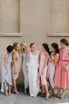 a group of women standing next to each other