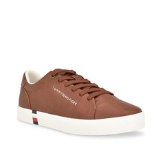 Tommy Hilfiger-Ramoso Sneaker Achieve a classic look with the Tommy Hilfiger Ramoso sneaker. Apart from the timeless profile, this lace-up sneaker has a signature stripe that adds to the authenticity. The memory foam insole keeps you comfortable as you move. Brown Sporty Sneakers For Spring, Sporty Brown Sneakers For Spring, Tommy Hilfiger Casual Sneakers With Round Toe, Casual Tommy Hilfiger Sneakers With Round Toe, Classic Tommy Hilfiger Sneakers With Round Toe, Tommy Hilfiger Sneakers For Spring, Tommy Hilfiger Round Toe Sneakers For Spring, Casual Tommy Hilfiger Sneakers With Cushioned Footbed, Brown Cushioned Sneakers For Spring