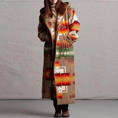 Introducing the latest must-have fashion piece - the boho printed hooded long coat! This stylish and luxurious coat comes in five amazing colors, perfect for layering and matching with your favorite outfits. It's also super warm, making it ideal for winter wear. Plus, the fun tribal print and hoodie design will make you stand out from the crowd. So don't miss out, grab one of these coats today and stay stylish all season long! Specifications Sleeve Length: Full Pattern Type: Printed Outerwear Ty Over Coat Women, Autumn Coats, Women Western Wear, Long Gilet, Trench Coats Women Long, Print Outerwear, Mode Mantel, Khaki Tops, Boho Mode