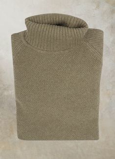 The Bolzano, our unique raglan-style turtleneck, from our signature buttery-soft, 2-ply Cashmere/Extrafine Merino yarn. The Bolzano is a pure, elevated "casual", and supremely elegant when worn with a 5-pocket pant or denims. From yarns twisted from Cashmere from Arbas goats from the Gobi and Altai regions of Mongolia, and Extra Fine Merino Wool from Australia, for maximum softness and luxurious feel. • 70% Ultrafine Merino Wool 30% Cashmere• Dry clean or hand wash, dry flat• Imported• Item # MG Fitted Textured Knit Turtleneck With Funnel Neck, Textured Merino Wool Funnel Neck Turtleneck, Merino Wool Textured Knit Funnel Neck Turtleneck, Winter Merino Wool Funnel Neck Top, Winter Khaki Sweater With Relaxed Fit, Khaki Relaxed Fit Winter Sweater, Khaki Relaxed Fit Sweater For Winter, Cozy Fitted Turtleneck, Cozy Fitted Sweater With Funnel Neck