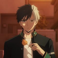 an anime character with short hair and black hair is holding a piece of food in his hand