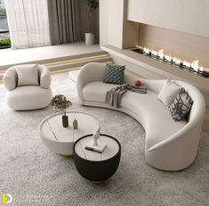 a modern living room with white furniture and fireplace