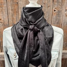 Our elegant wild rag/scarf in black with Southwest pattern. A perfect square - measuring 42"x42". Adding that extra touch of a western style to your outfit. 100% soft silk feeling polyester is durable to keep you warm in the cold and fashionable for any occasion. Plus it's machine washable!  Additional accessories are available- (Please see our slide options on our site)  Leather slides Western concho slides Crystal concho slide  Buckle slides Southwest Pattern, Wither Strap, Beaded Dog Collar, Bridle Bag, Designer Dog Collars, Western Buckles, Perfect Squares, Wild Rag, Dog Collars & Leashes