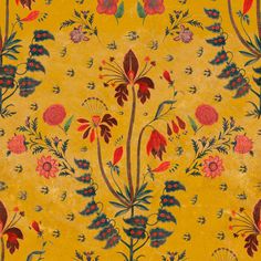 a yellow background with flowers and leaves on it