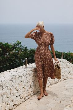 Chic Puff Sleeve Midi Dress For Vacation, Casual Knee-length Midi Dress With Elastic Sleeves, Knee-length Midi Dress With Smocked Back For Day Out, Summer Midi Puff Sleeve Dress With Smocked Back, Beach Midi Dress With Smocked Back And Short Sleeves, Beach Maxi Dress With Puff And Gathered Sleeves, Knee-length Midi Dress With Elastic Sleeves For Brunch, Fitted Midi Dress With Gathered Sleeves For Vacation, Beach Midi Dress With Ruched Puff Sleeves