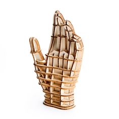 a hand made out of bamboo sticks on a white background